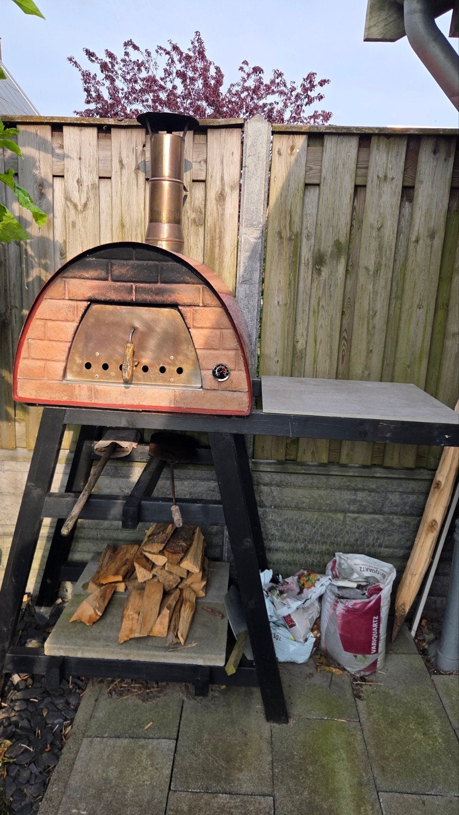 pizza oven met uit inklapbaar onderstel, Ophalen