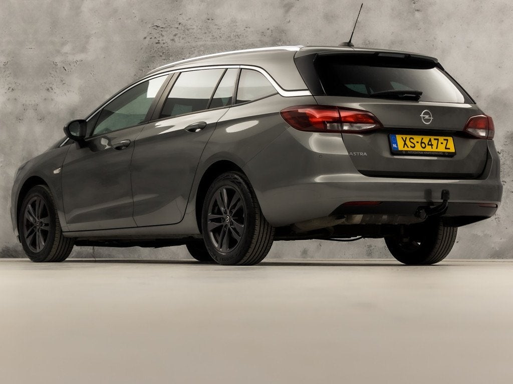 Opel Astra Sports Tourer 1.0 Turbo Sport (APPLE CARPLAY, GRO, Auto's, Opel, Voorwielaandrijving, 12 maanden, Stof, 1178 kg