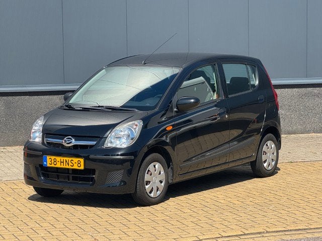Daihatsu Cuore 1.0 Trend Automaat (bj 2009), Auto's, 12 maanden, Stof, Zwart, 18 €/maand