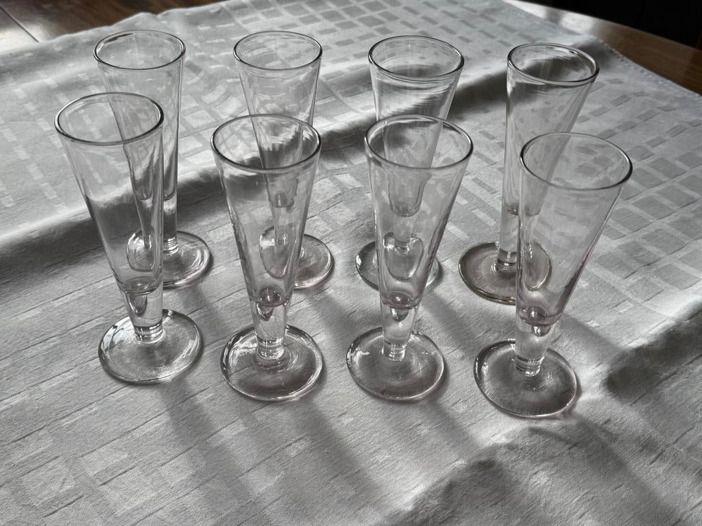 Acht champagne flutes, Ophalen