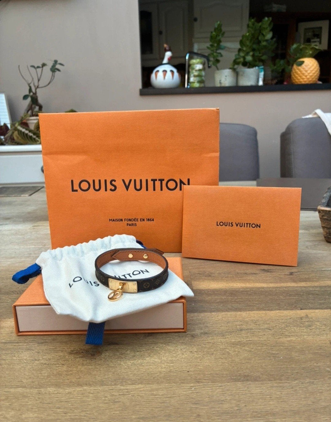 Louis Vuitton armband maat 19, Ophalen of Verzenden, Zo goed als nieuw, Bruin, Leer