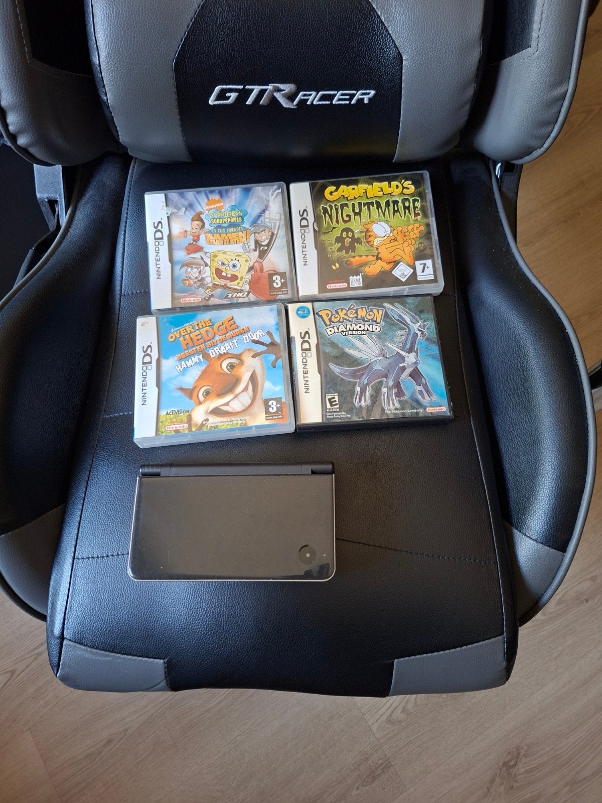 Nintendo DS XL met 4 games en hoesje, Dsi XL, Gebruikt, Zwart, Ophalen of Verzenden
