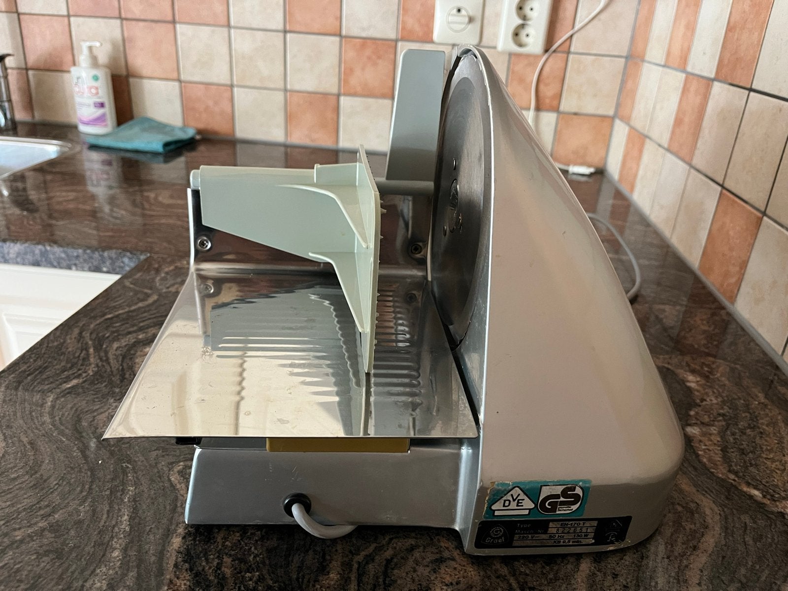 Snijmachine van Graef, Ophalen