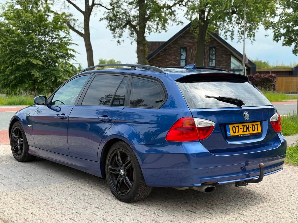 BMW 3-serie Touring 318i Business Line Airco Navi Cruise PDC, Achterwielaandrijving, Blauw, Origineel Nederlands, Handgeschakeld
