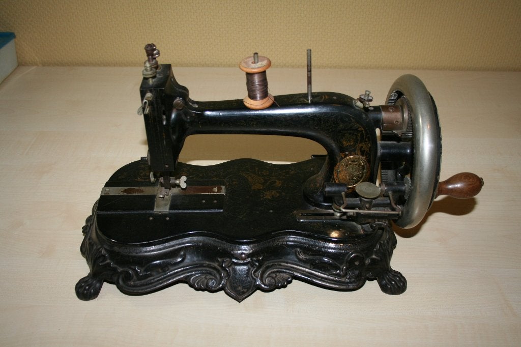 Naaimachine( antiek), Ophalen