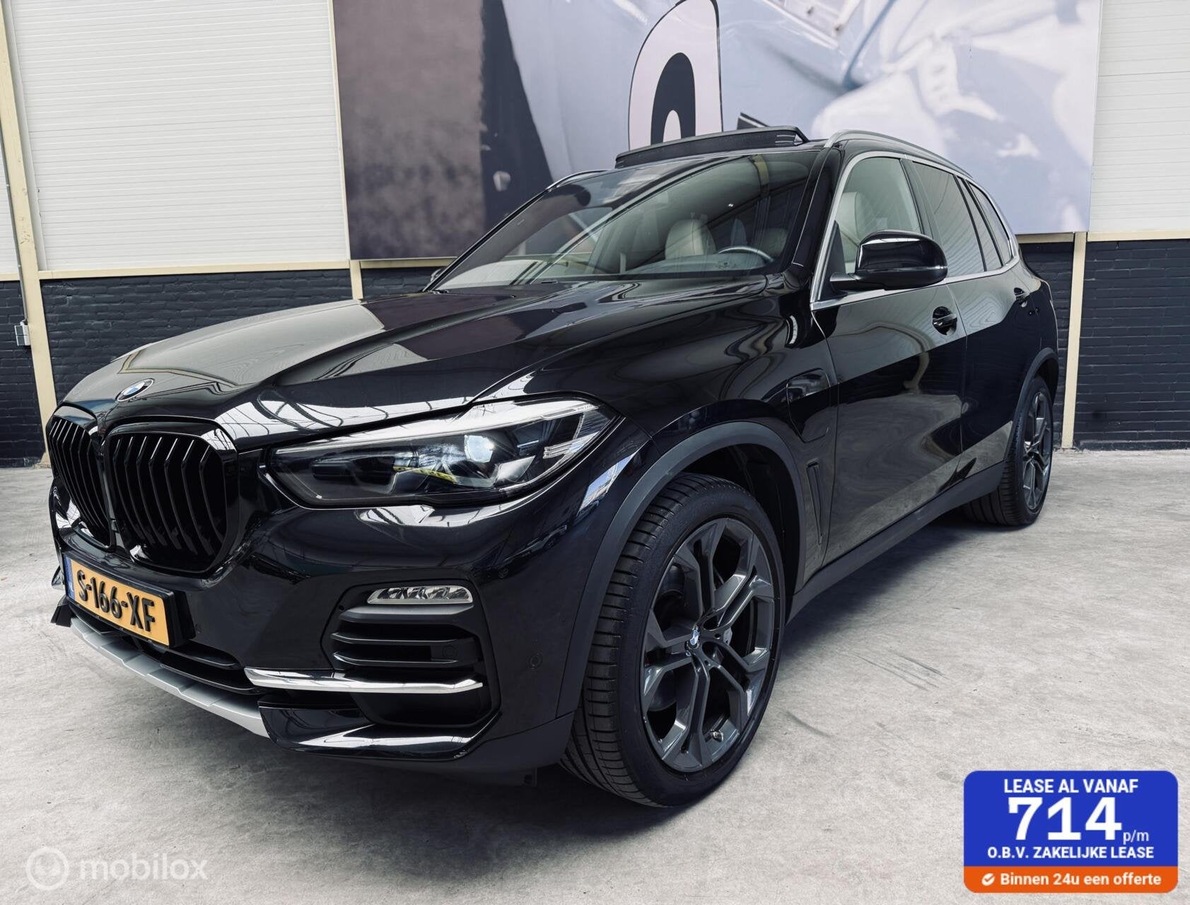 BMW X5 xDrive45e|PANO|H&K|TREKHAAK|21INCH|CAMERA|, Auto's, Gebruikt, 394 pk, Zwart, Vierwielaandrijving