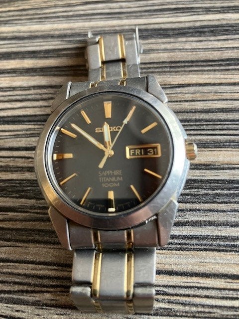 Seiko Horloge Sapphire glas  Titanium  100m met dag en datum, Polshorloge, Overige materialen, Ophalen of Verzenden, Zo goed als nieuw