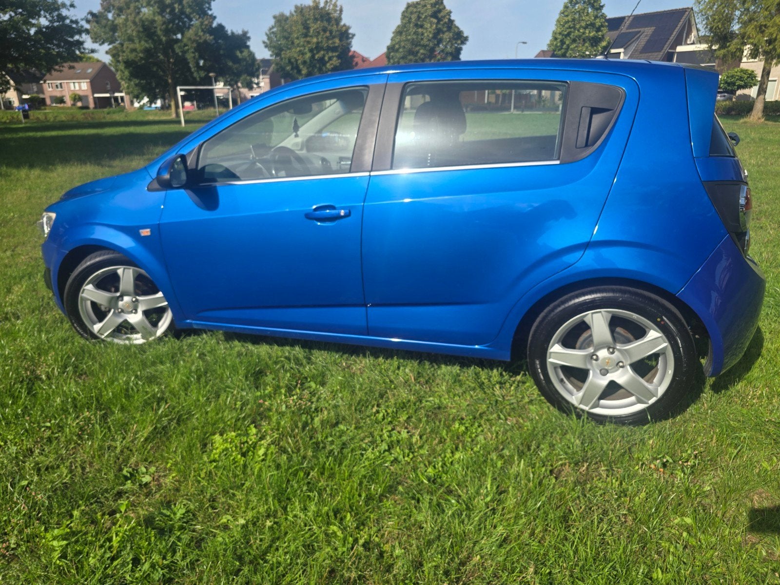Chevrolet Aveo 1.4 LTZ 5D 2011 lees beschrijving goed!, Auto's, Voorwielaandrijving, Euro 5, 4 cilinders, Blauw