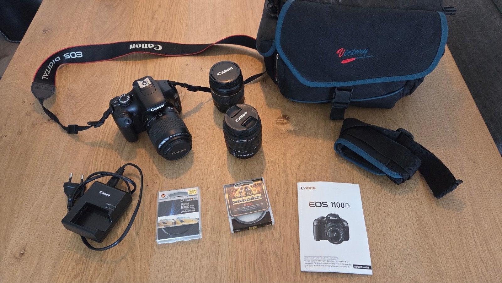 Canon EOS 1100D Spiegelreflexcamera met 2 extra lenzen, Audio, Tv en Foto, Spiegelreflex, Canon, Draagriem, Ophalen of Verzenden