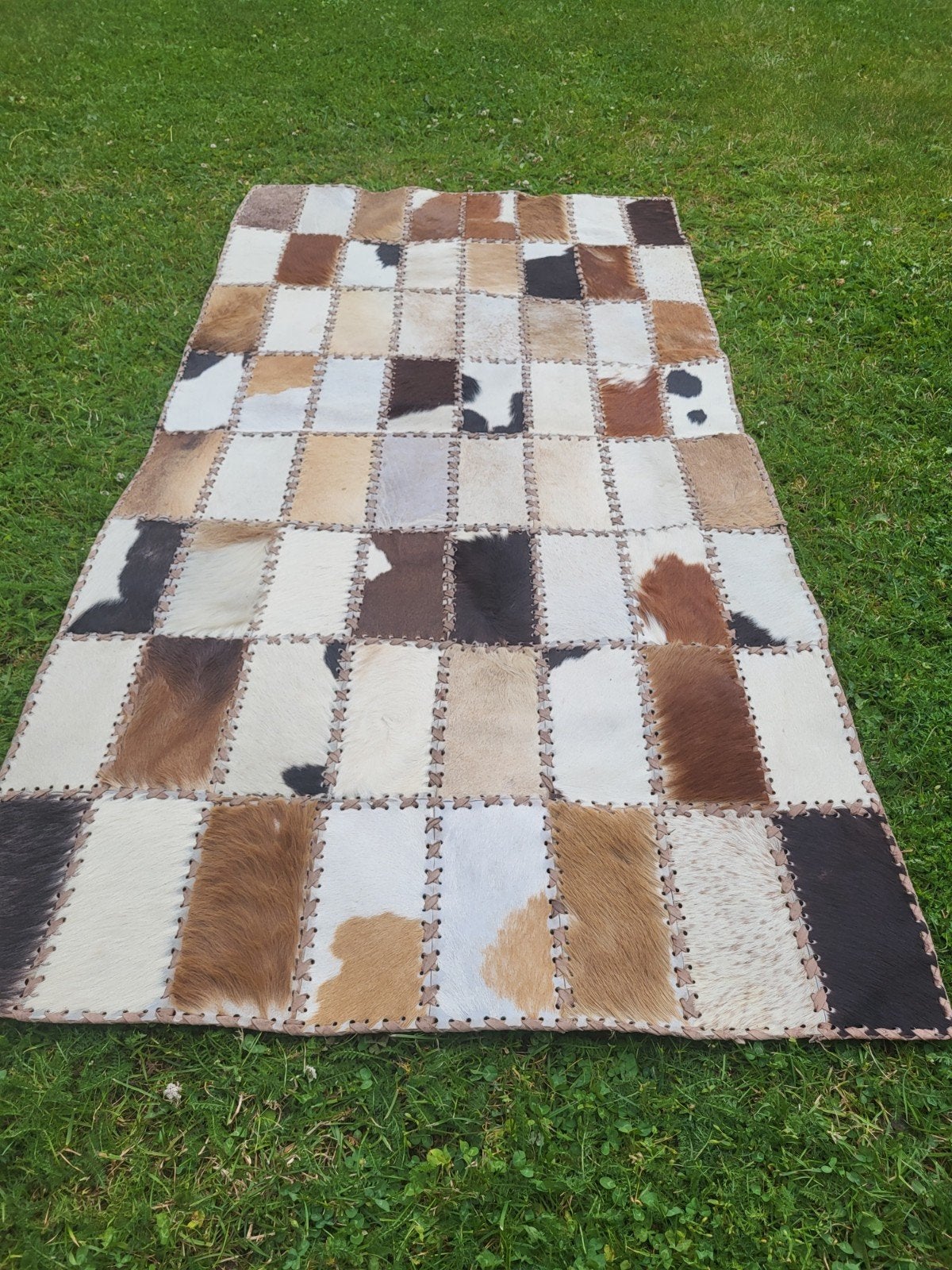 Koeiehuid vloerkleedje, Ophalen of Verzenden, Gebruikt, Rechthoekig, 50 tot 100 cm