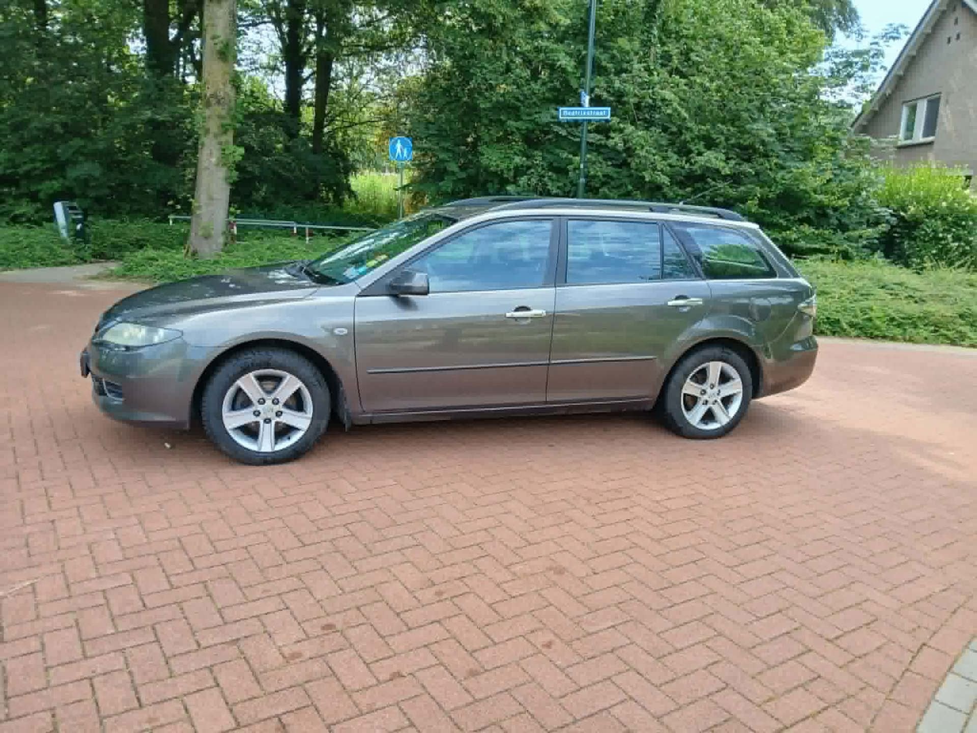 Mazda 6 Sportbreak 1.8i Touring, Auto's, Stof, Gebruikt, 4 cilinders, 6 sportbreak