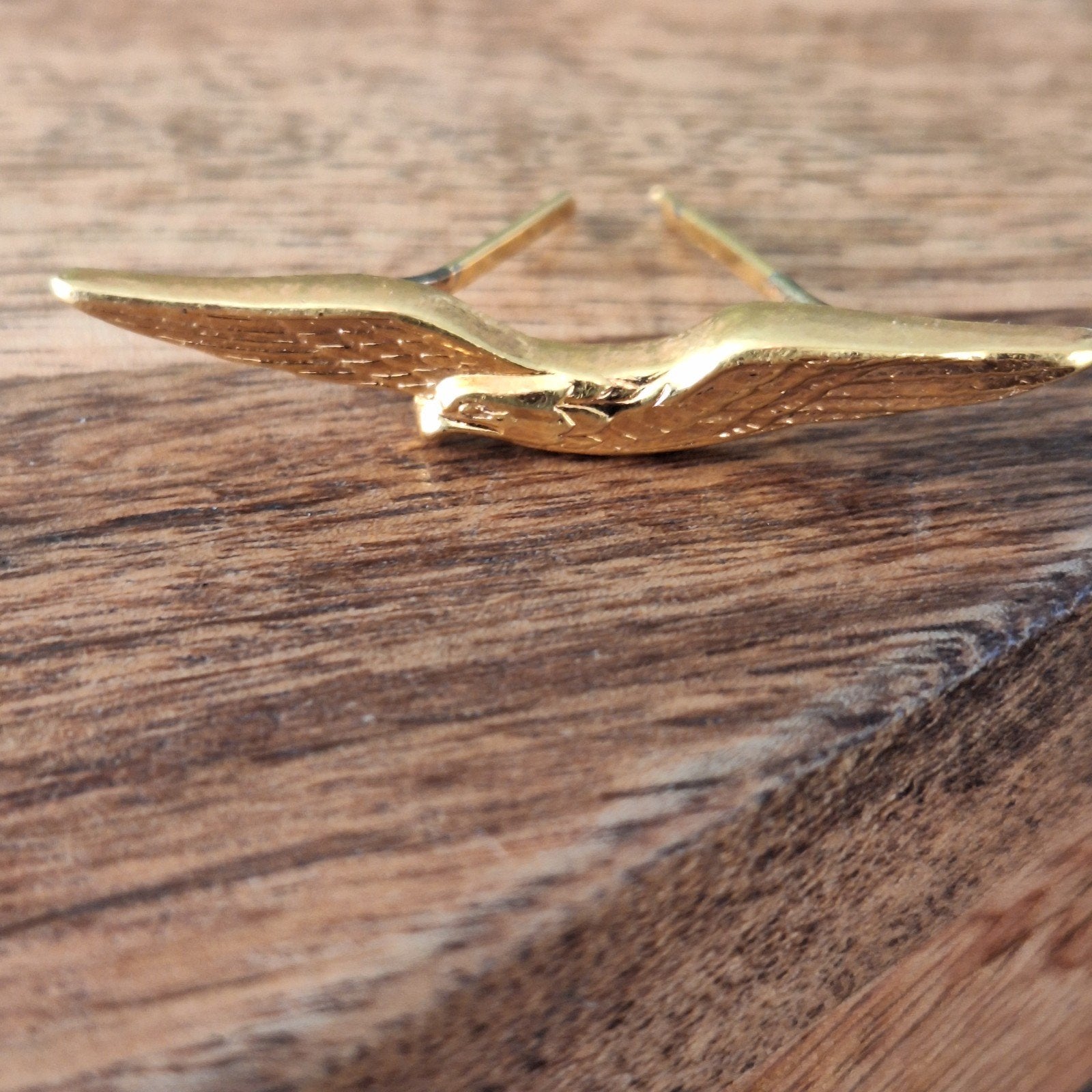 Goudkleurige broche in vogelvorm, Ophalen of Verzenden, Zo goed als nieuw, Goud, Overige materialen
