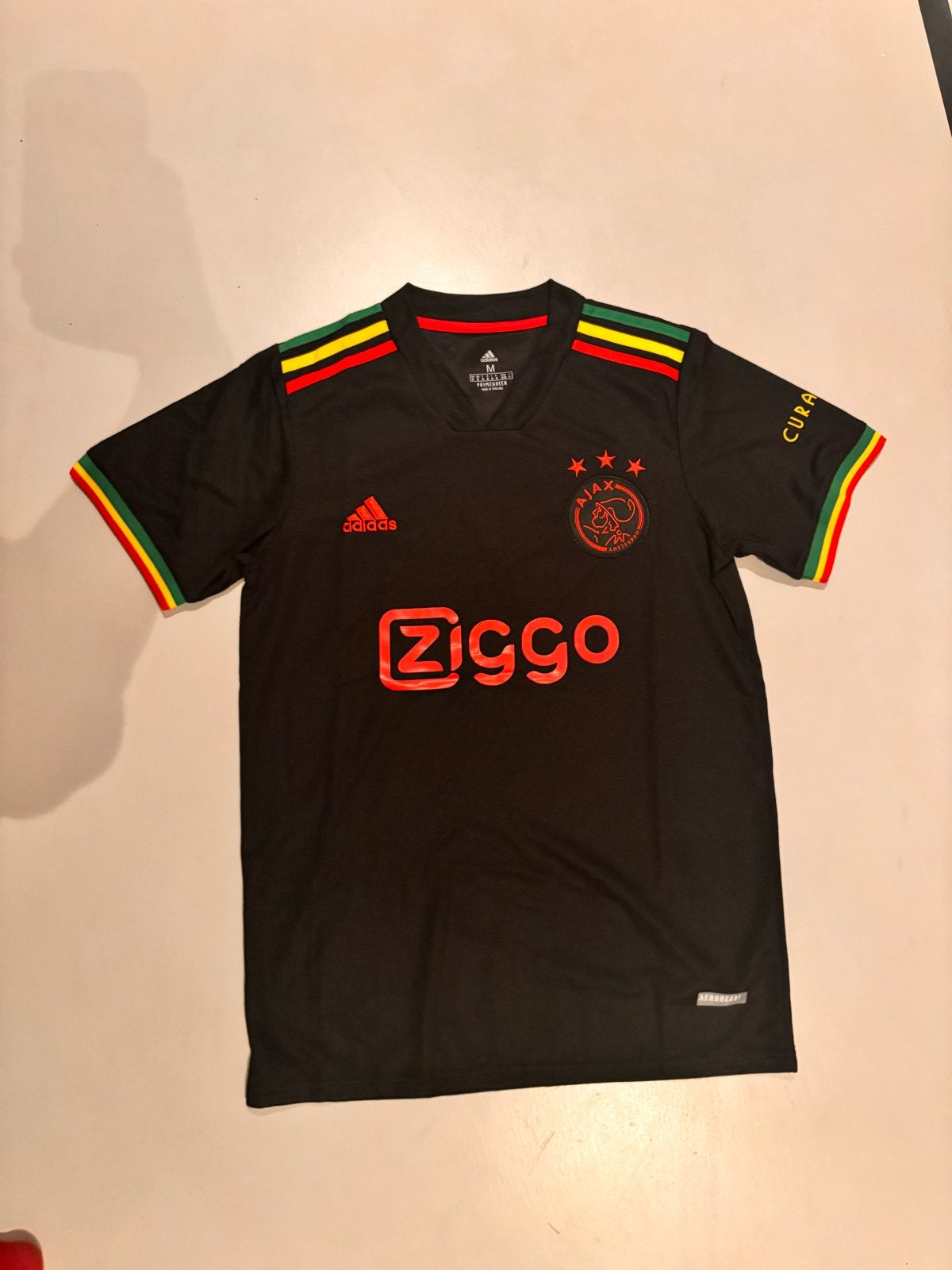 Ajax uitshirt Bob Marley editie - Maat M- Nieuw met label, Ophalen of Verzenden, Zo goed als nieuw