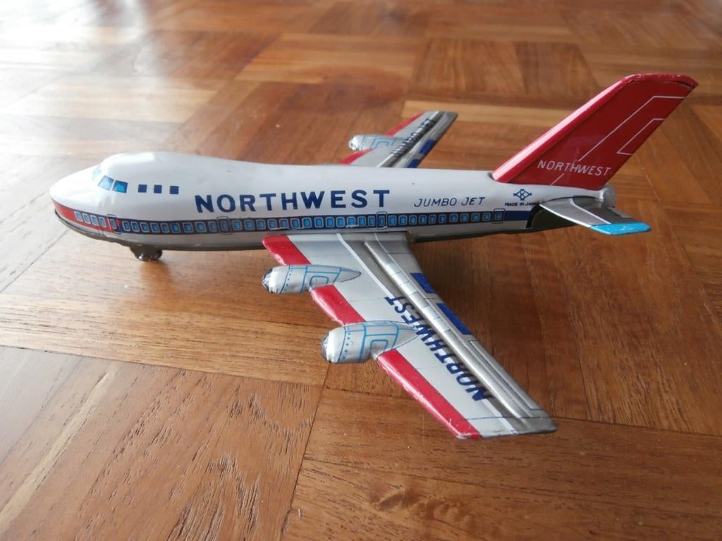 Blikken Jumbo Jet van Northwest 19 cm frictie uit Japan., Antiek en Kunst, Antiek | Speelgoed, Ophalen of Verzenden