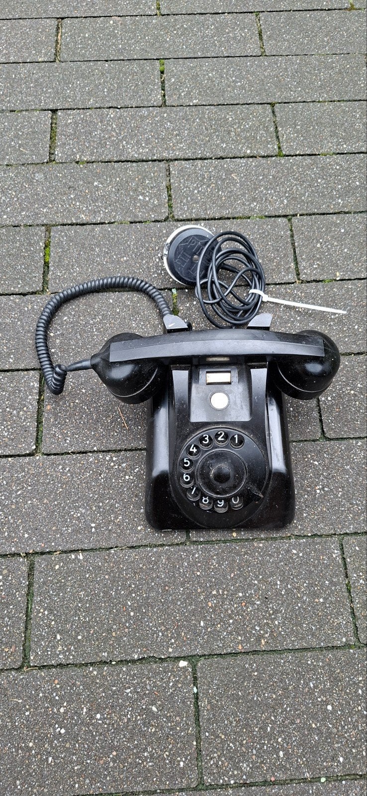 zwarte bakelieten PTT telefoon, Ophalen
