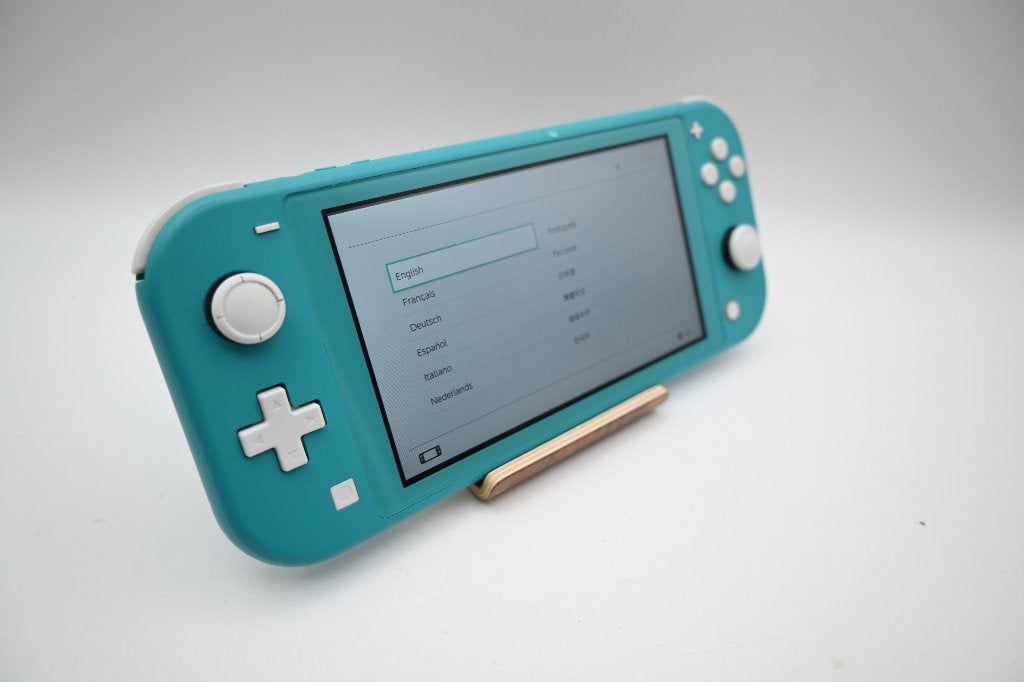 Nintendo Switch lite 32GB 2019 Turquoise, 1 speler, Ophalen of Verzenden, Zo goed als nieuw, X