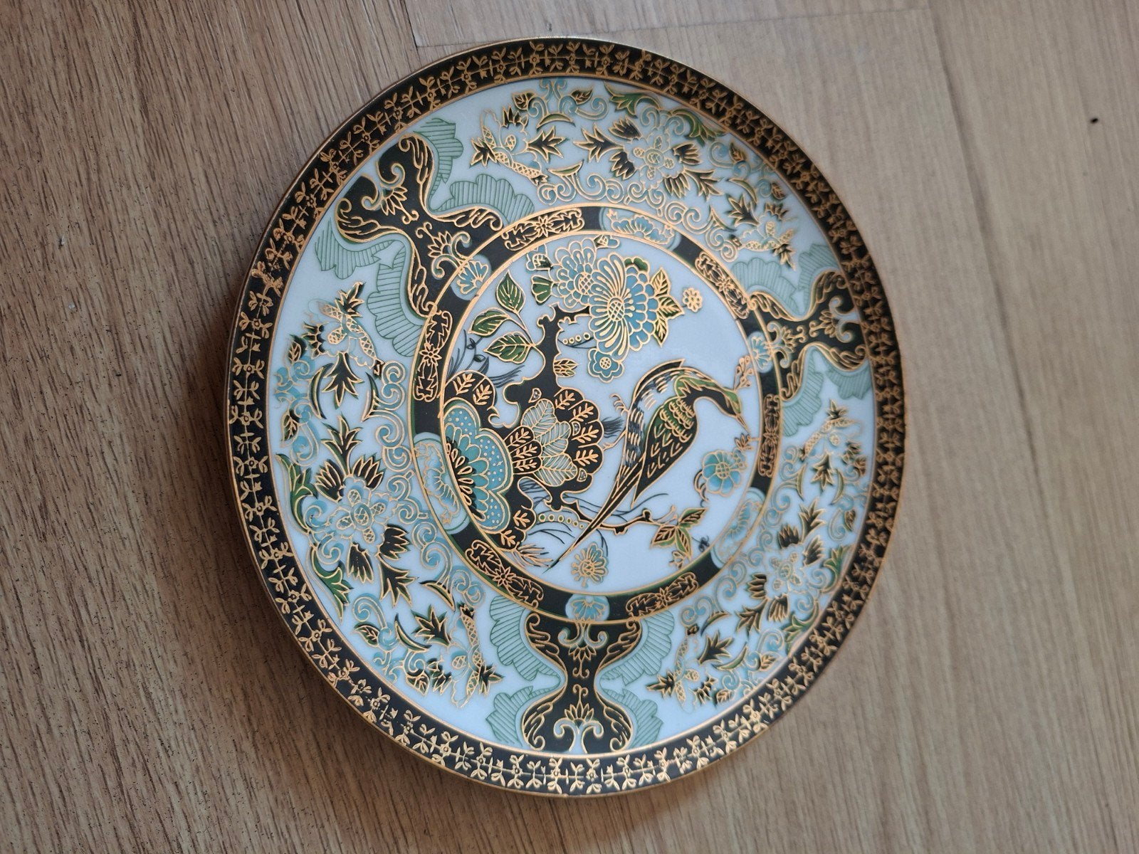 Decoratief bord met vogelmotief en gouden details, Ophalen of Verzenden