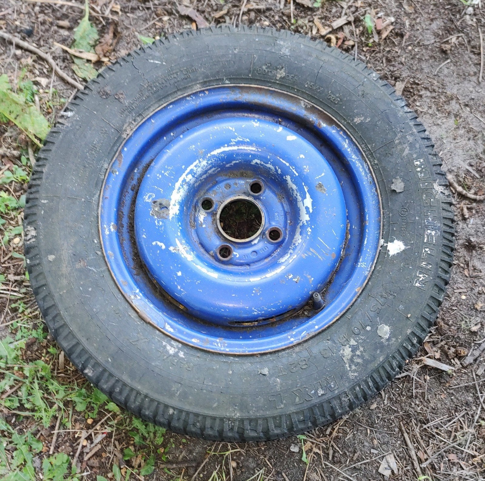 een gebruikte band met velg 175/70R13, Ophalen