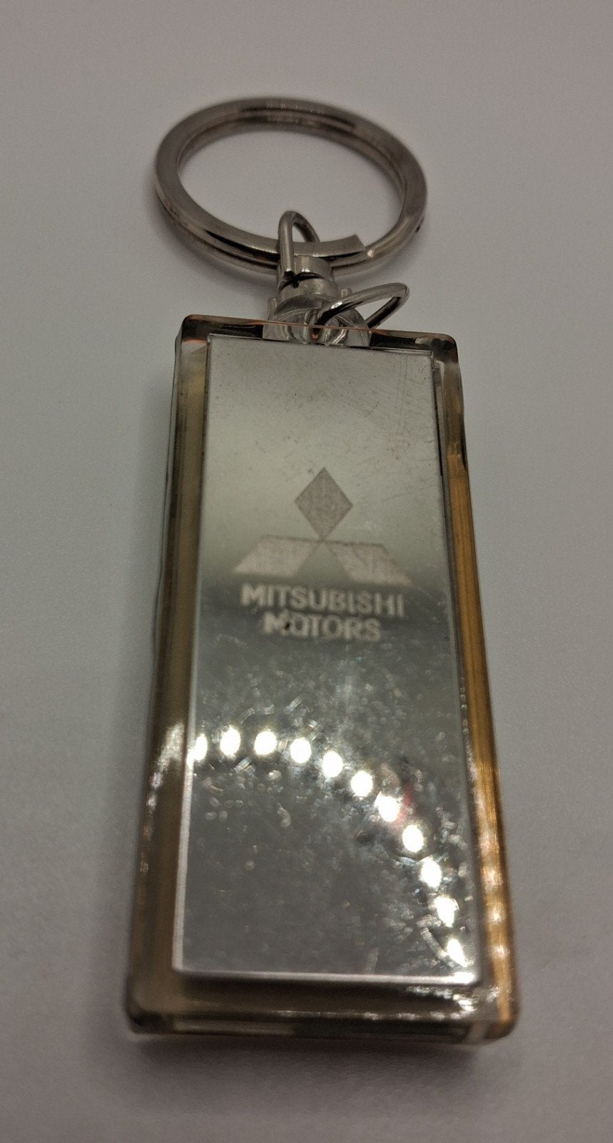 Oude Mitsubishi Motors Heartbeat sleutelhanger, Ophalen of Verzenden