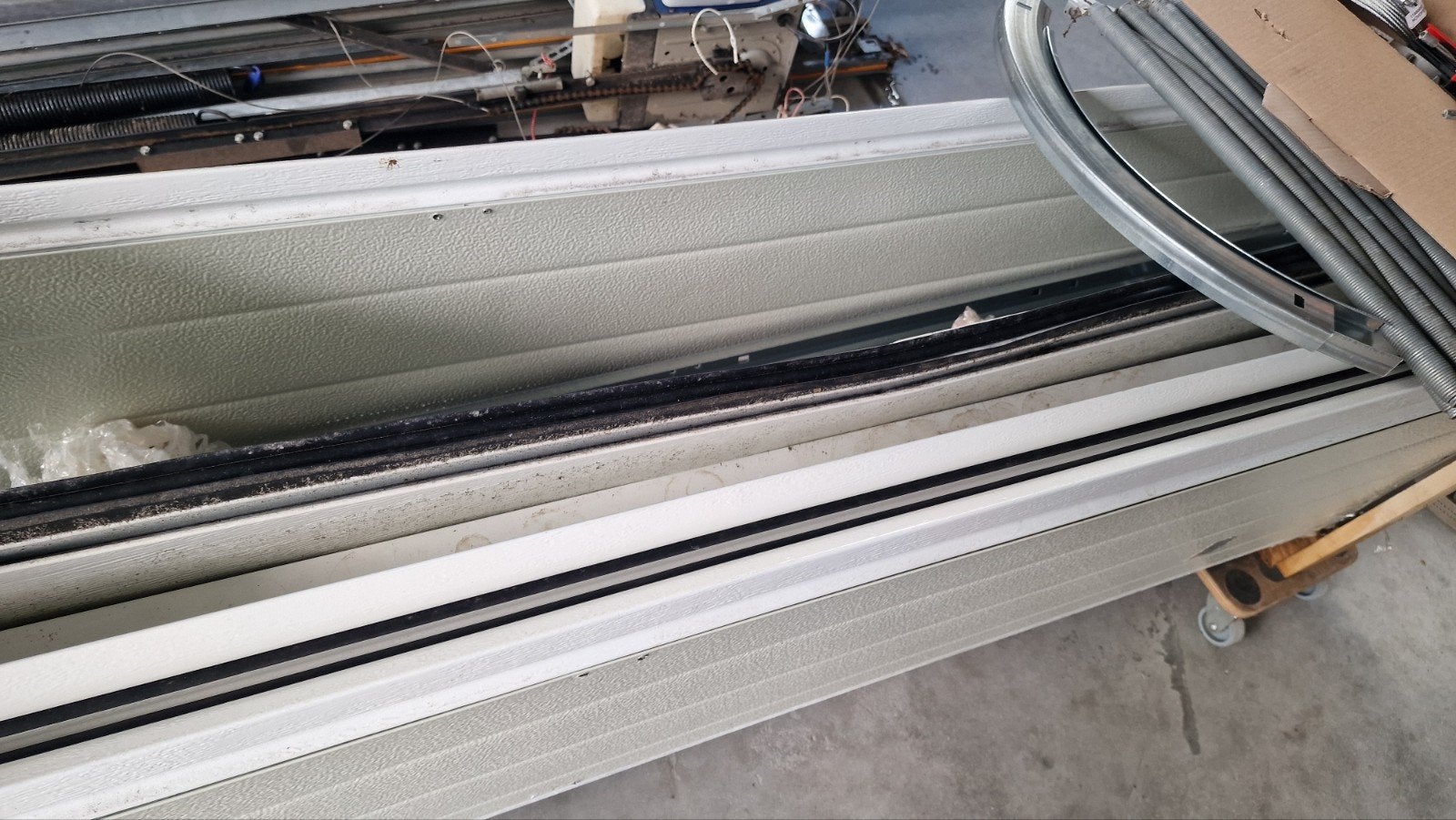 Novoferm ISO45 sectionale garagedeur opknapper, Ophalen, Gebruikt, Garagedeur, 120 cm of meer