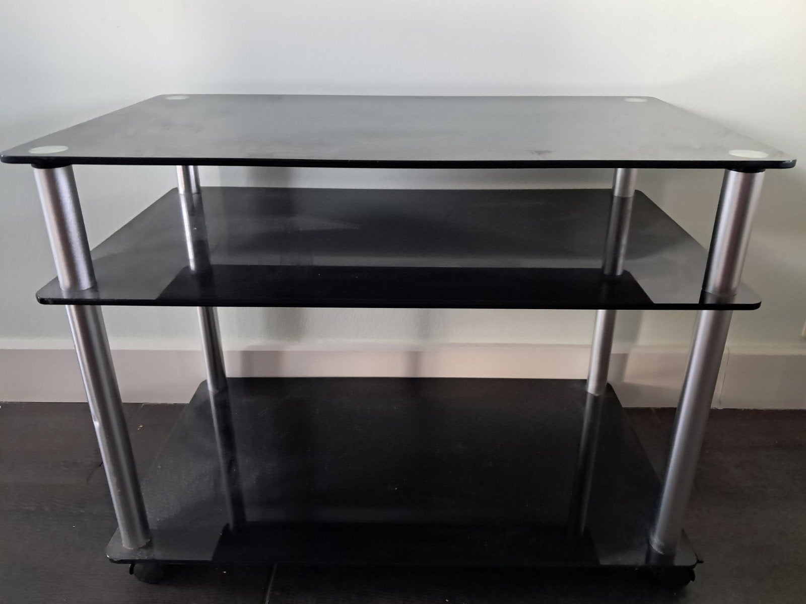 Zwart televisie tafeltje op wieltjes., Ophalen, Gebruikt, 50 tot 100 cm, Glas