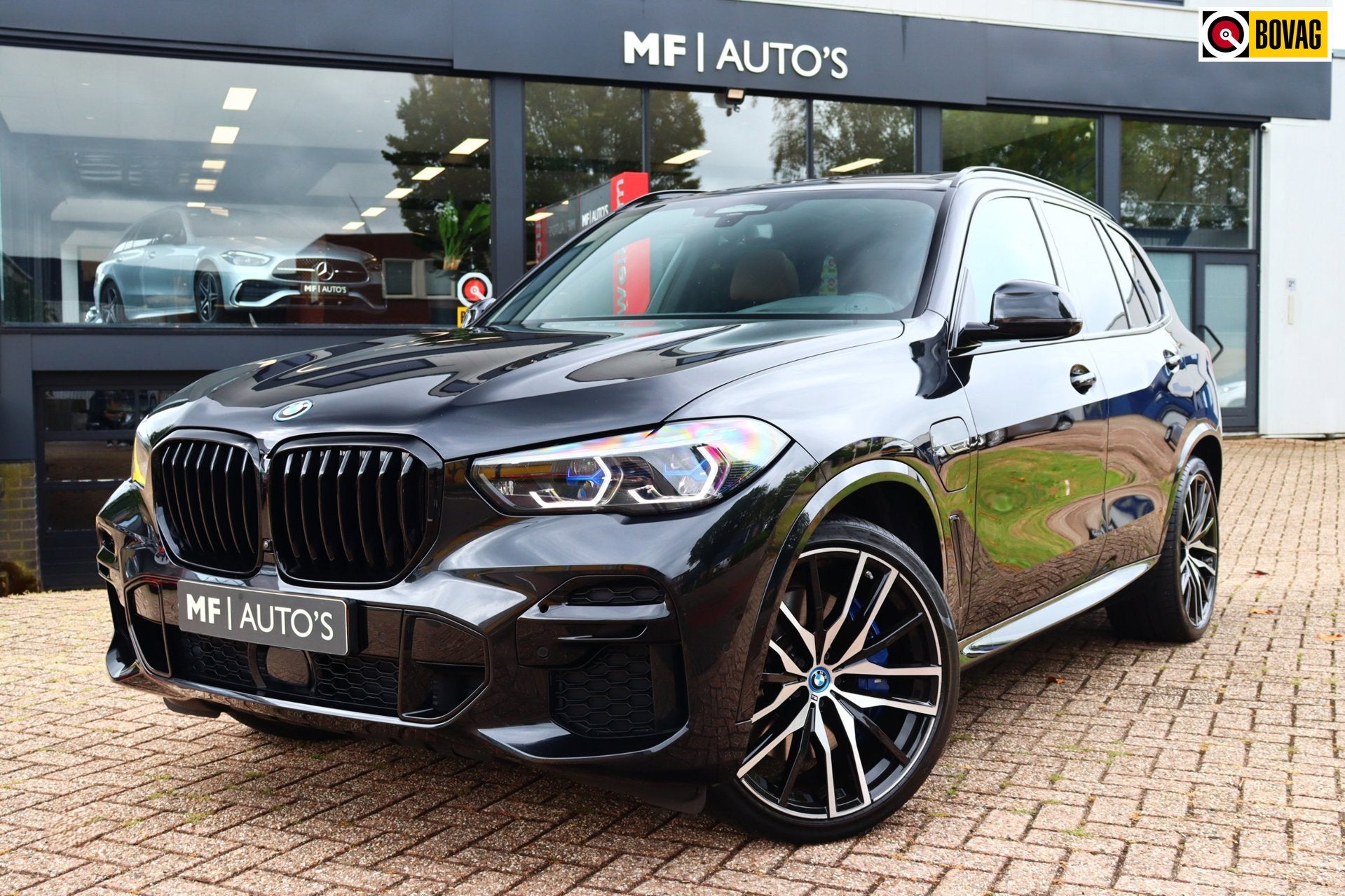 BMW X5 XDrive45e M-Sport|Skylounge|Laser|HUD|Massage|Luchtve, Dealer onderhouden, Gebruikt, Zwart, Vierwielaandrijving