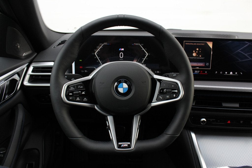BMW i4 xDrive40 Gran Coupé M Sport / Schuif-kanteldak / Tre, Auto's, BMW, Elektrische stoelverstelling, Leder, Blauw, Zilver of Grijs