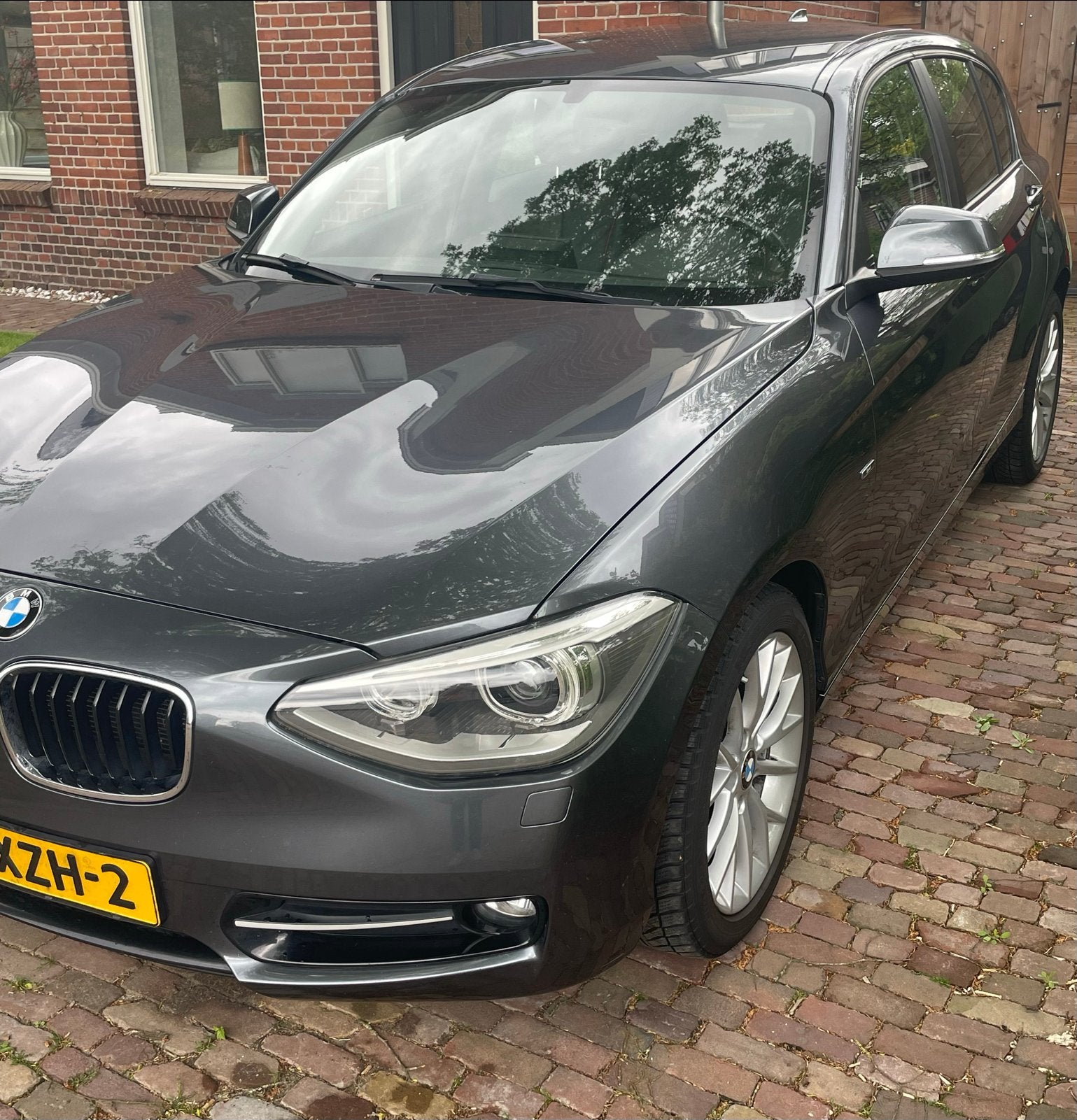 BMW 1-Serie 114I 225pk 5-DR 2012 Grijs, Auto's, BMW, 1-Serie, Euro 5, Achterwielaandrijving, Zwart