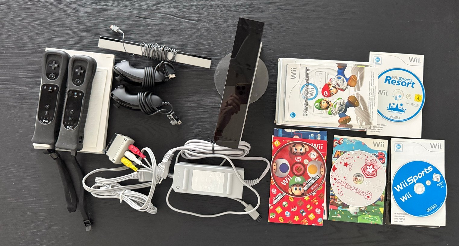 Complete Nintendo Wii bundel met 2 controllers en 6 games, Ophalen of Verzenden, Gebruikt, Met 2 controllers, Met games