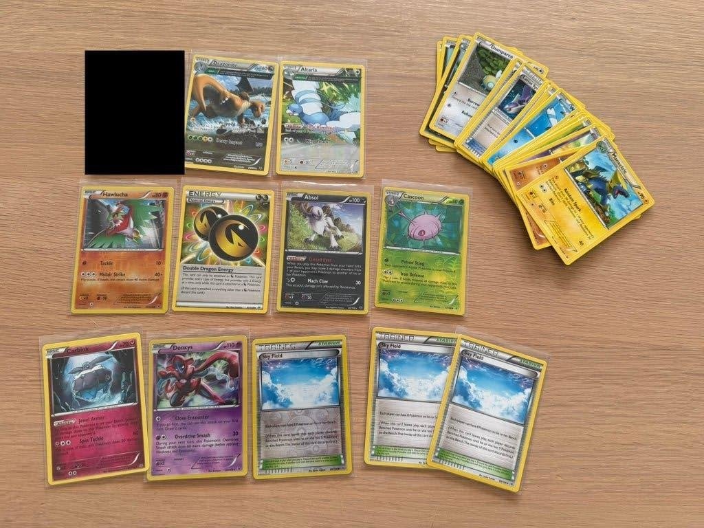 Pokemon Kaarten Roaring Skies incl. rare en reverse Pokémon, Ophalen of Verzenden, Zo goed als nieuw