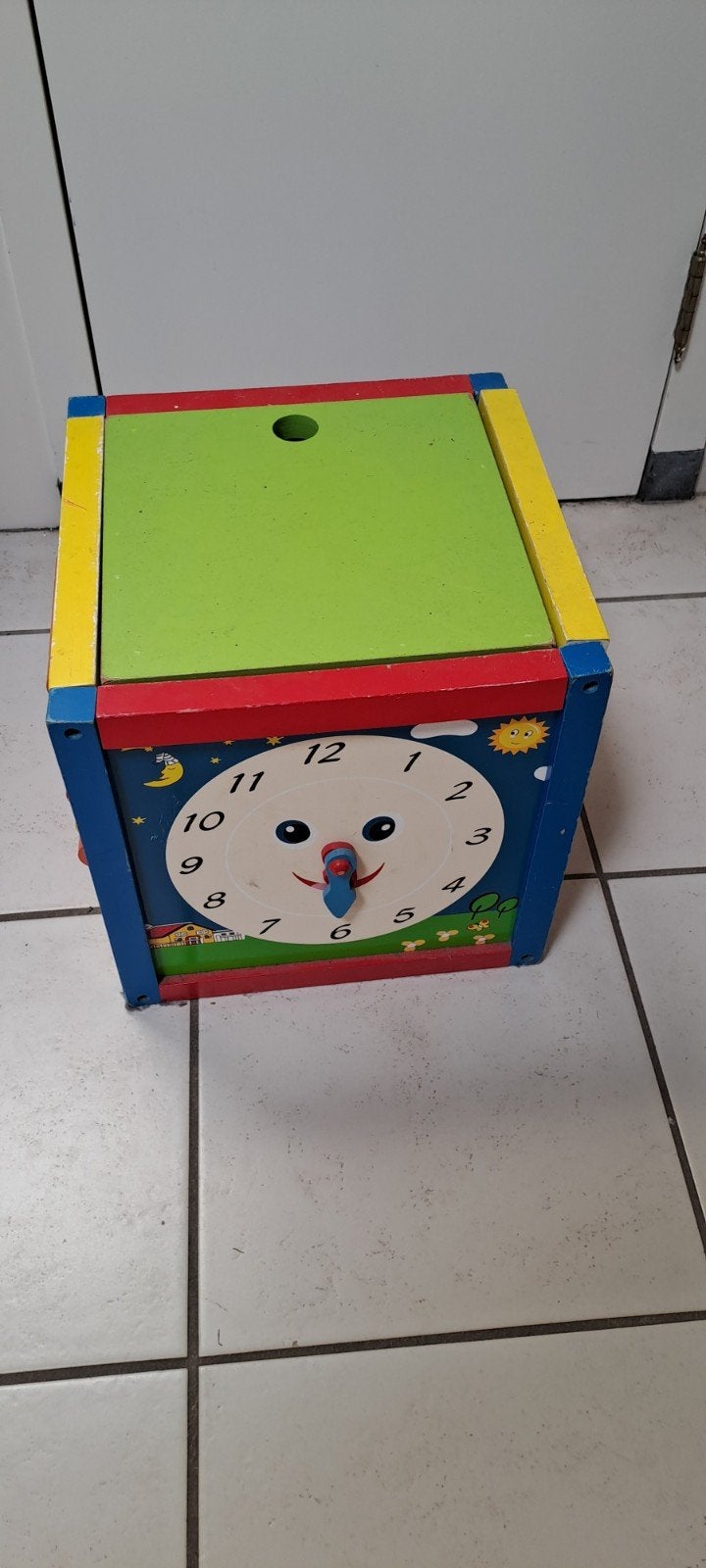 Houten kubus, Ophalen