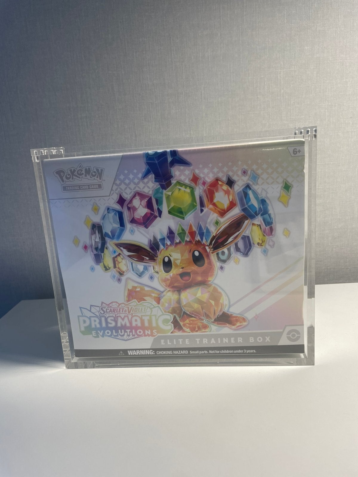 Prismatic Evolution ETB, Hobby en Vrije tijd, Verzamelkaartspellen | Pokémon, Ophalen of Verzenden, Zo goed als nieuw, Boosterbox