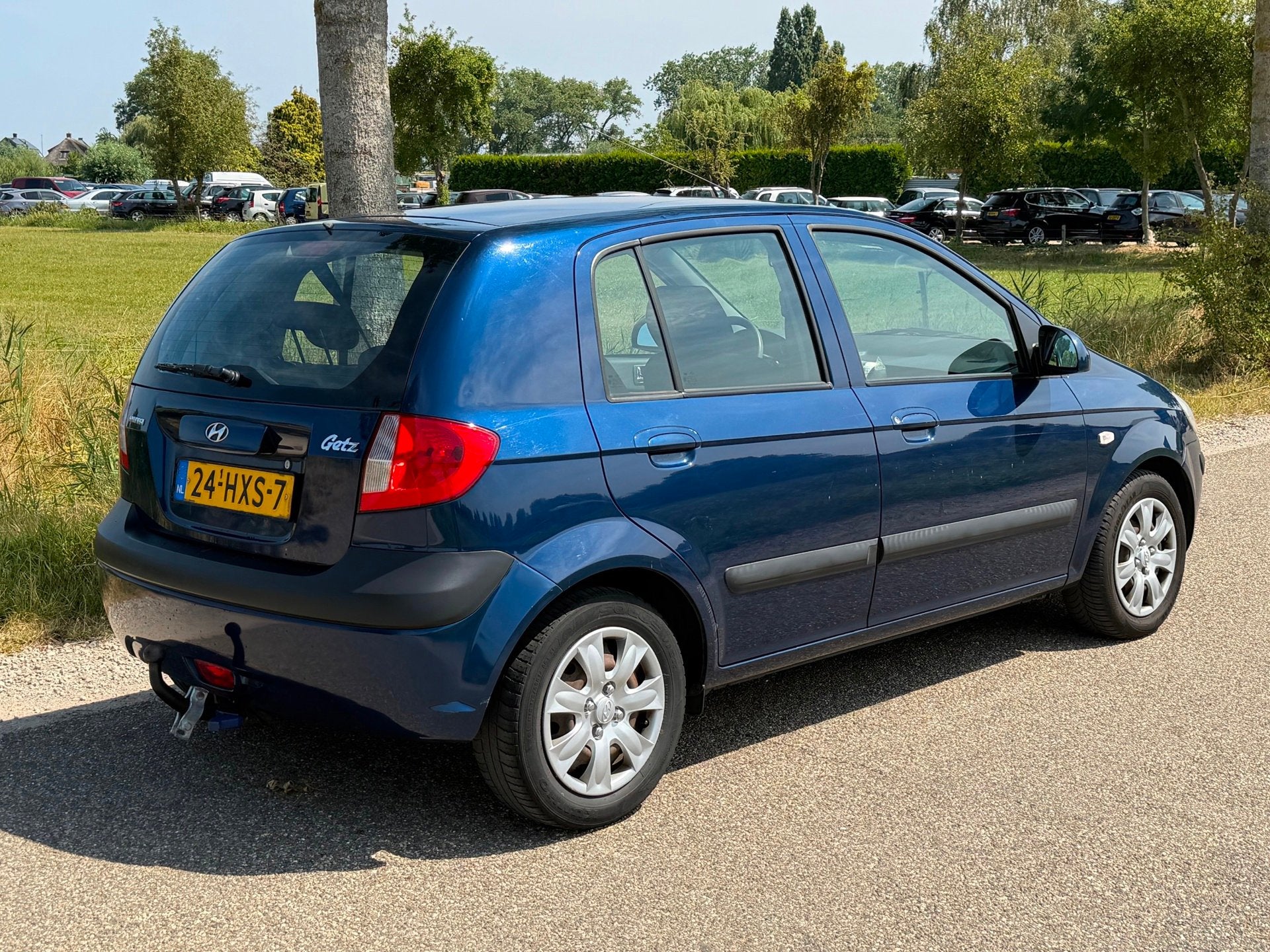 Hyundai Getz 1.4i Active Cool APK 10-2027 Airco NAP, Auto's, Hyundai, Voorwielaandrijving, Zwart, 4 cilinders, Blauw