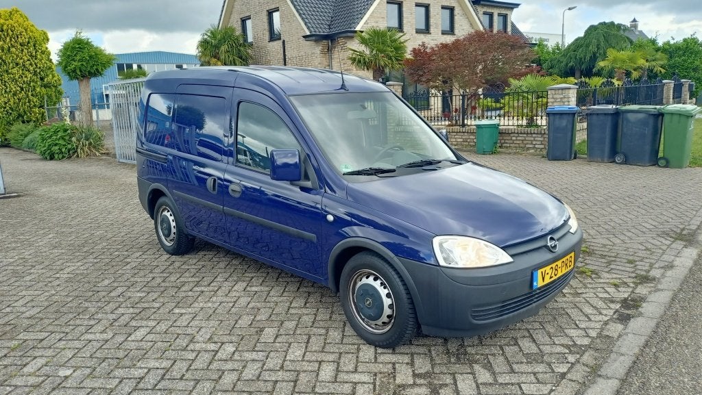 Opel Combo Onbekend (bj 2011), Auto's, Euro 5, Stof, Gebruikt, Zwart