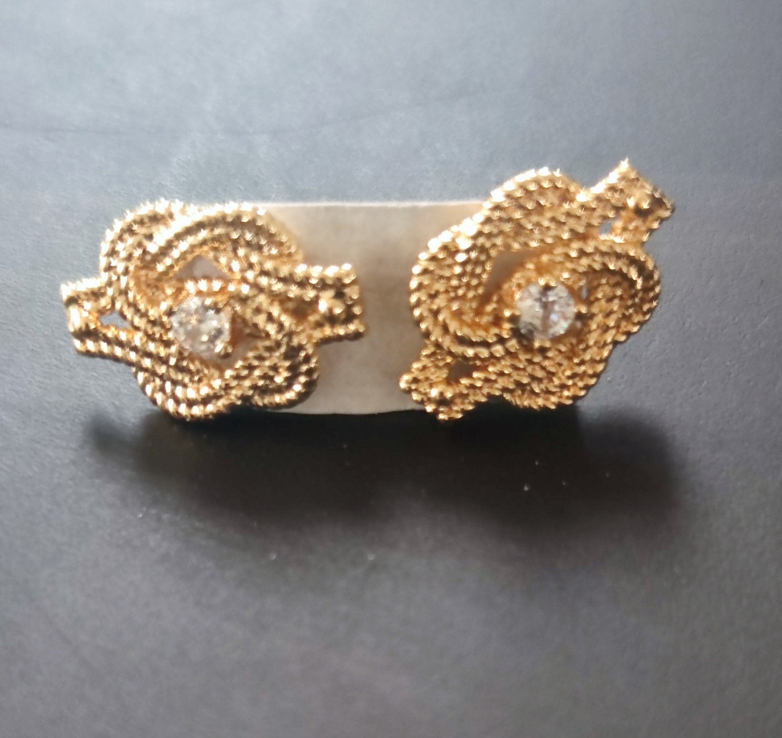 Zeer mooie Surinaamse mattenklopper oorbellen, Ophalen of Verzenden, Nieuw, Goud, Zilver