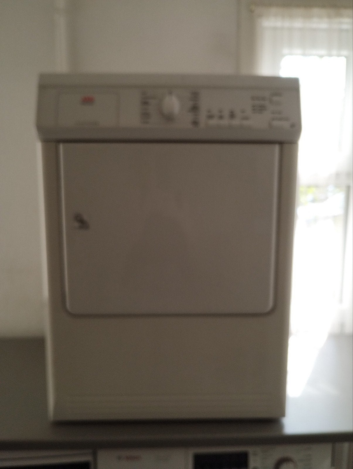 AEG droger, Ophalen, 6 tot 8 kg, Gebruikt, Minder dan 85 cm