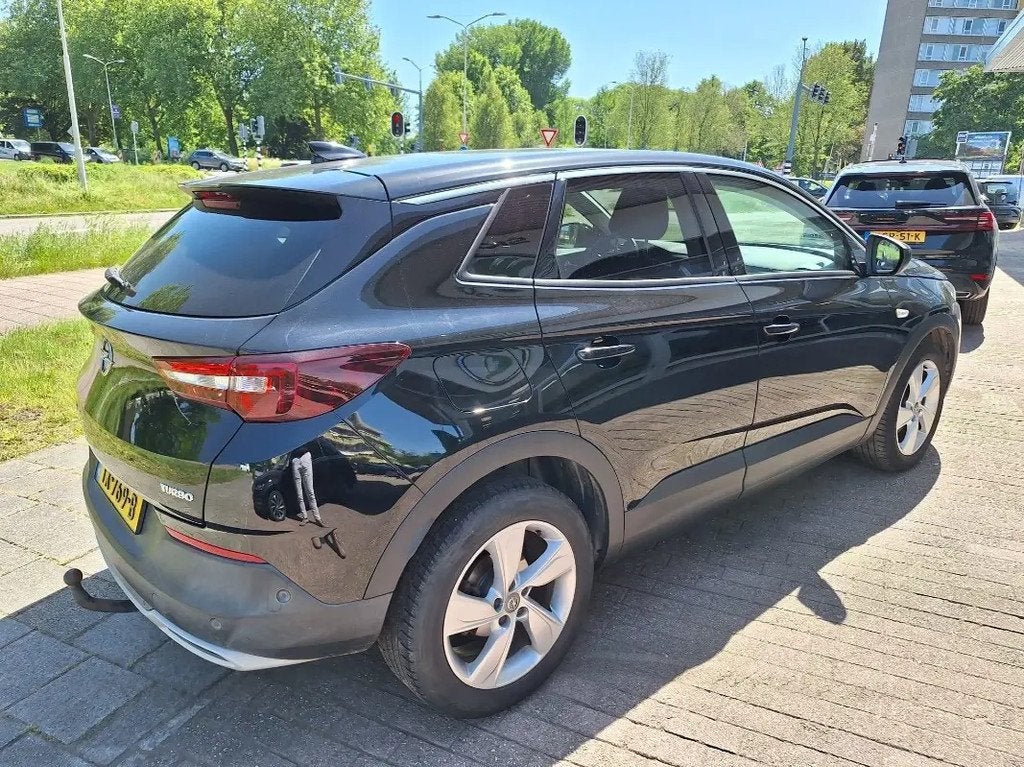 Opel Grandland X 1.2 Turbo Innovation Automaat LED Navi Trek, Auto's, Opel, Gebruikt, 1199 cc, Leder en Stof, Zwart