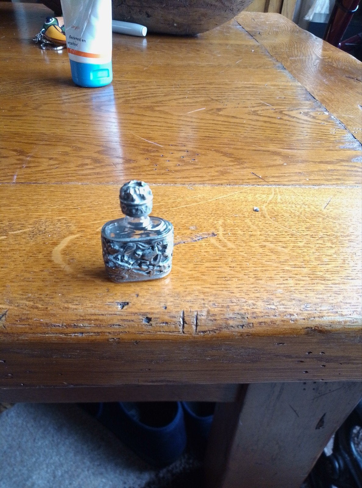 Te koop antieke zilveren parfum flesje met vogel motief, Ophalen of Verzenden