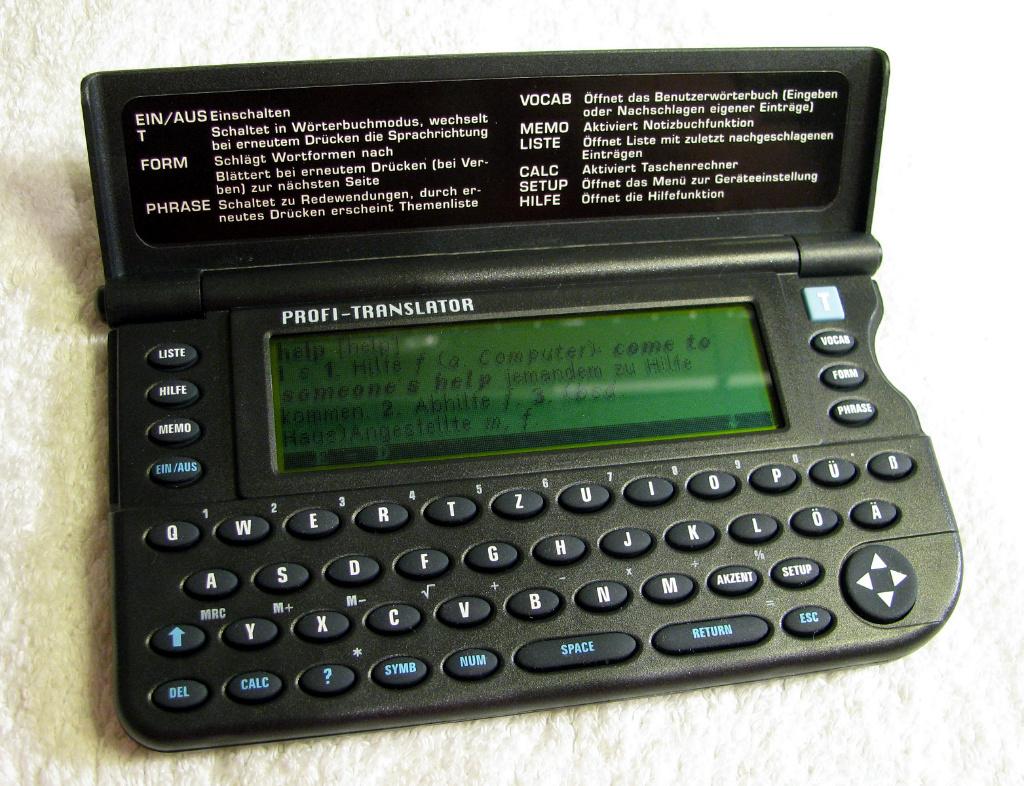 Vintage Hexaglot vertaalcomputer. In orig verpakking met man, Ophalen