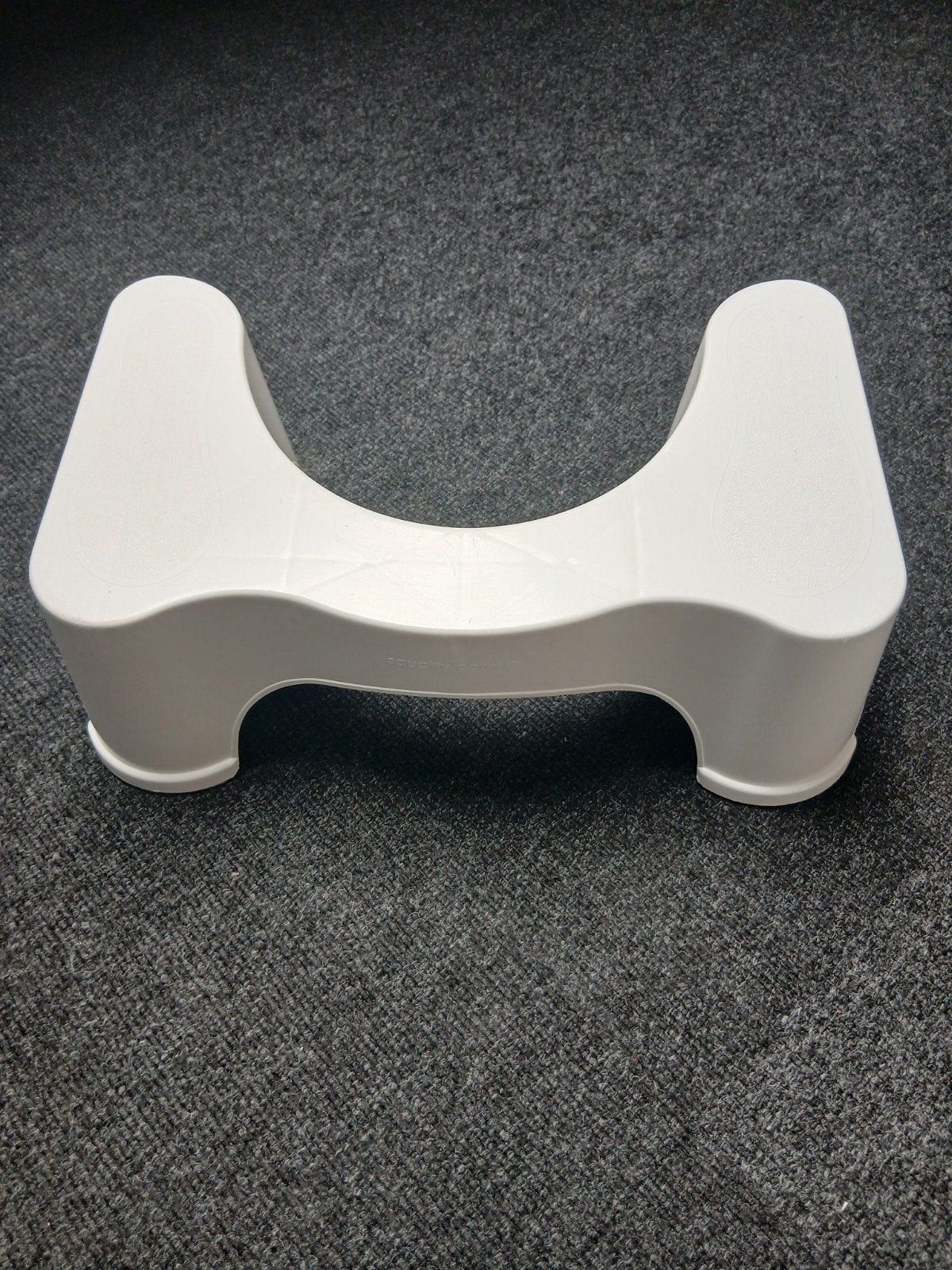 Opstap ergonomisch: Squatty Potty met antislipranden, Ophalen