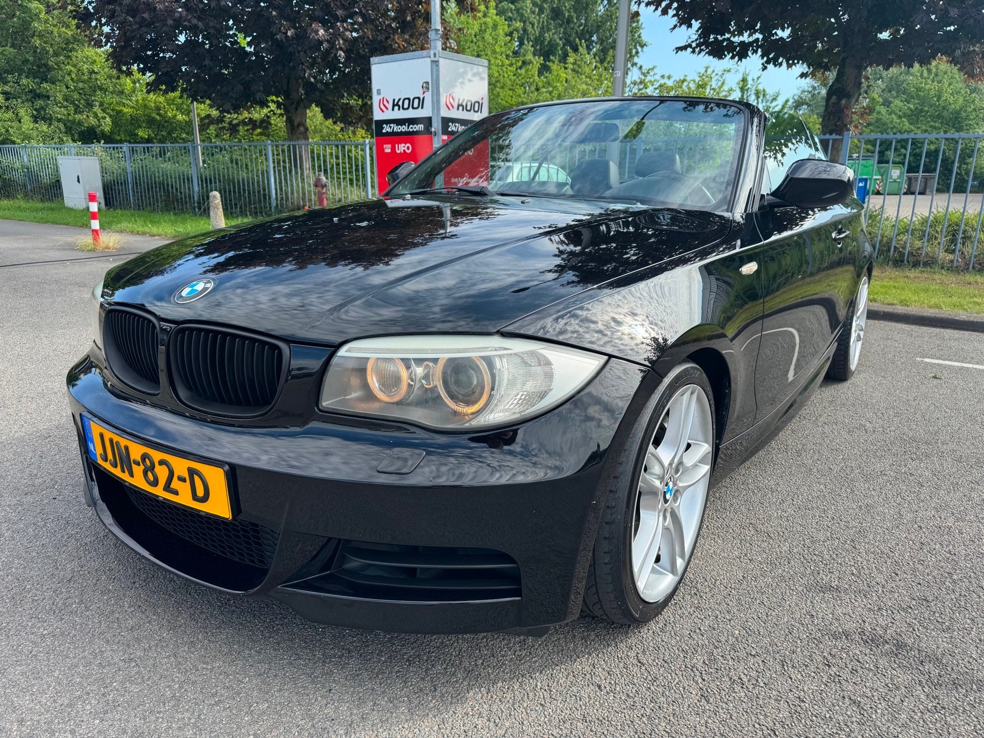 BMW 1-serie M135i xDrive High Executive Cabriolet AUT Leder, Auto's, Euro 5, Gebruikt, Zwart, Cabriolet