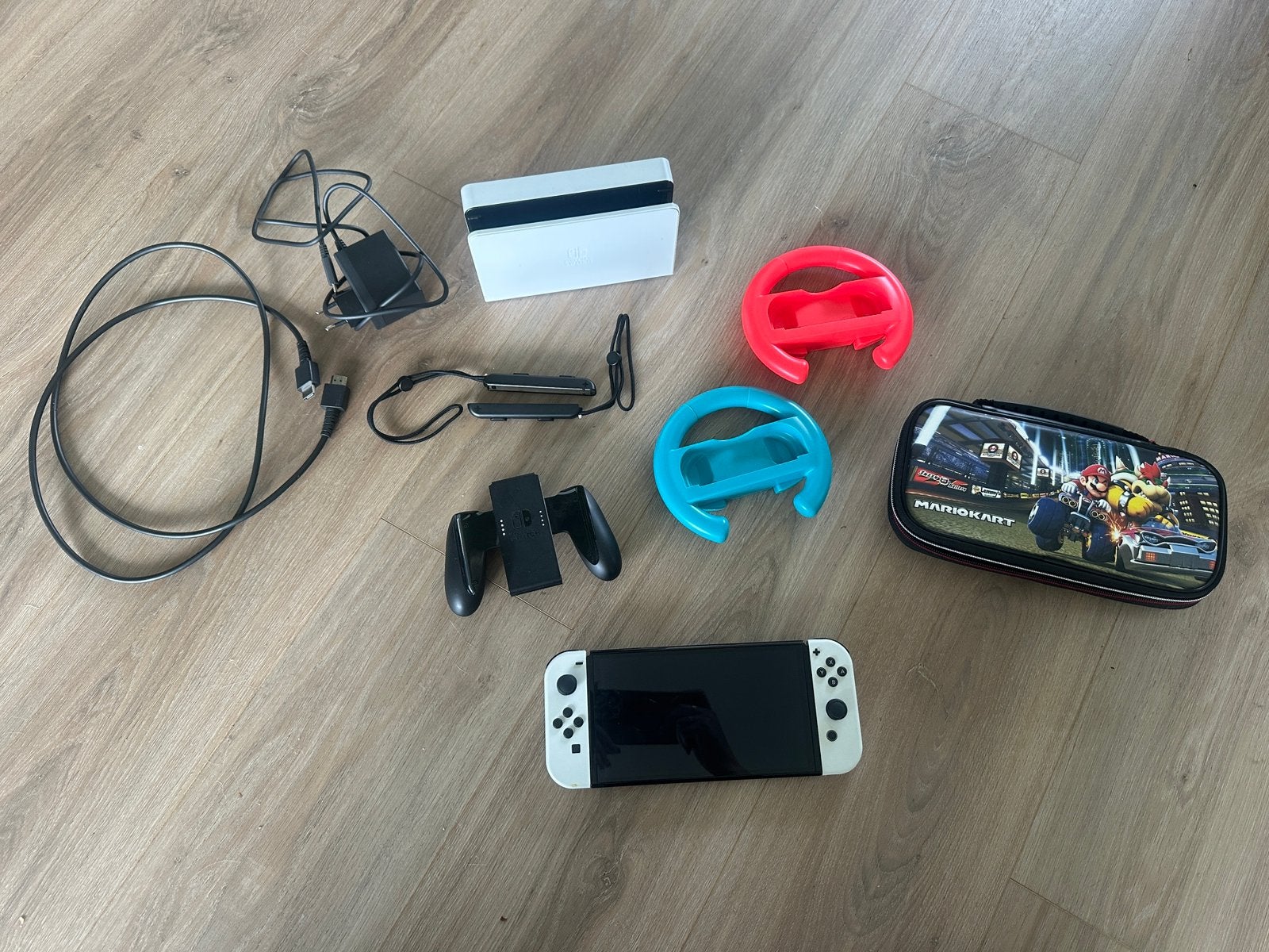 Nintendo Switch OLED krasvrij met accessoires, Ophalen of Verzenden, Zo goed als nieuw, Met 2 controllers, Switch OLED