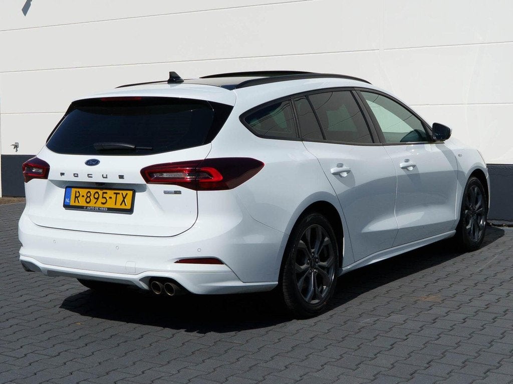 Ford Focus Wagon 1.0 EcoBoost Hybrid 125pk ST Line | Panoram, Auto's, Gebruikt, Wit, Origineel Nederlands, Handgeschakeld