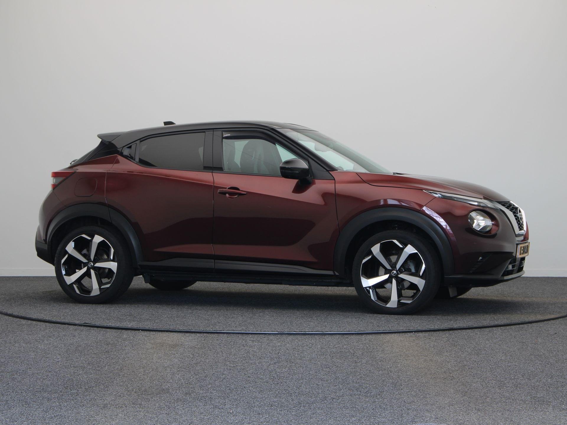 Foto 12 van Nissan Juke 1.0 DIG-T Tekna | Trekhaak | Stoelverwarming | B
