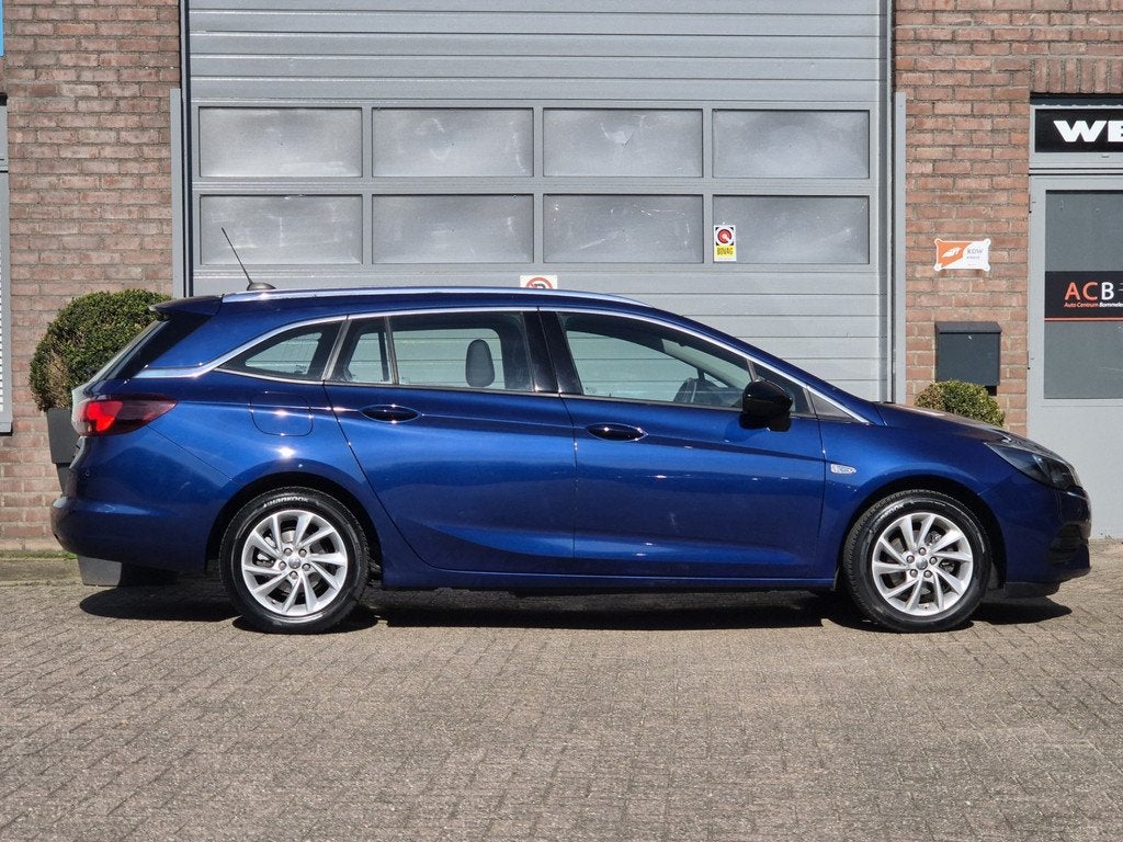 Opel Astra Sports Tourer 1.2 Business Elegance Dealer onderh, Gebruikt, Euro 6, 1199 cc, Blauw
