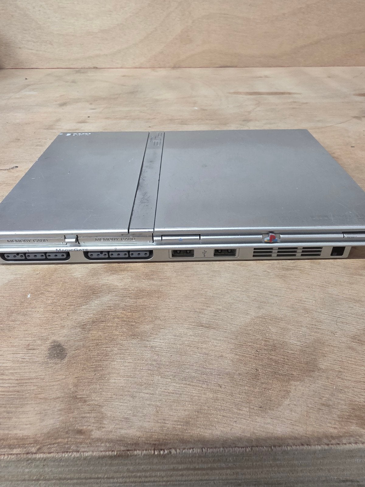 Defecte PlayStation 2 Slim Zilver - Voor onderdelen, Spelcomputers en Games, Spelcomputers | Sony PlayStation 2, Ophalen, Zonder controller