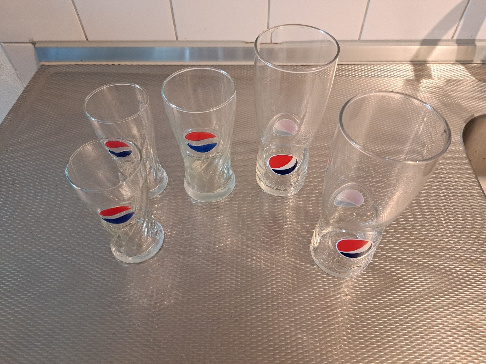 Coca-Cola en Pepsi glazen set, Ophalen