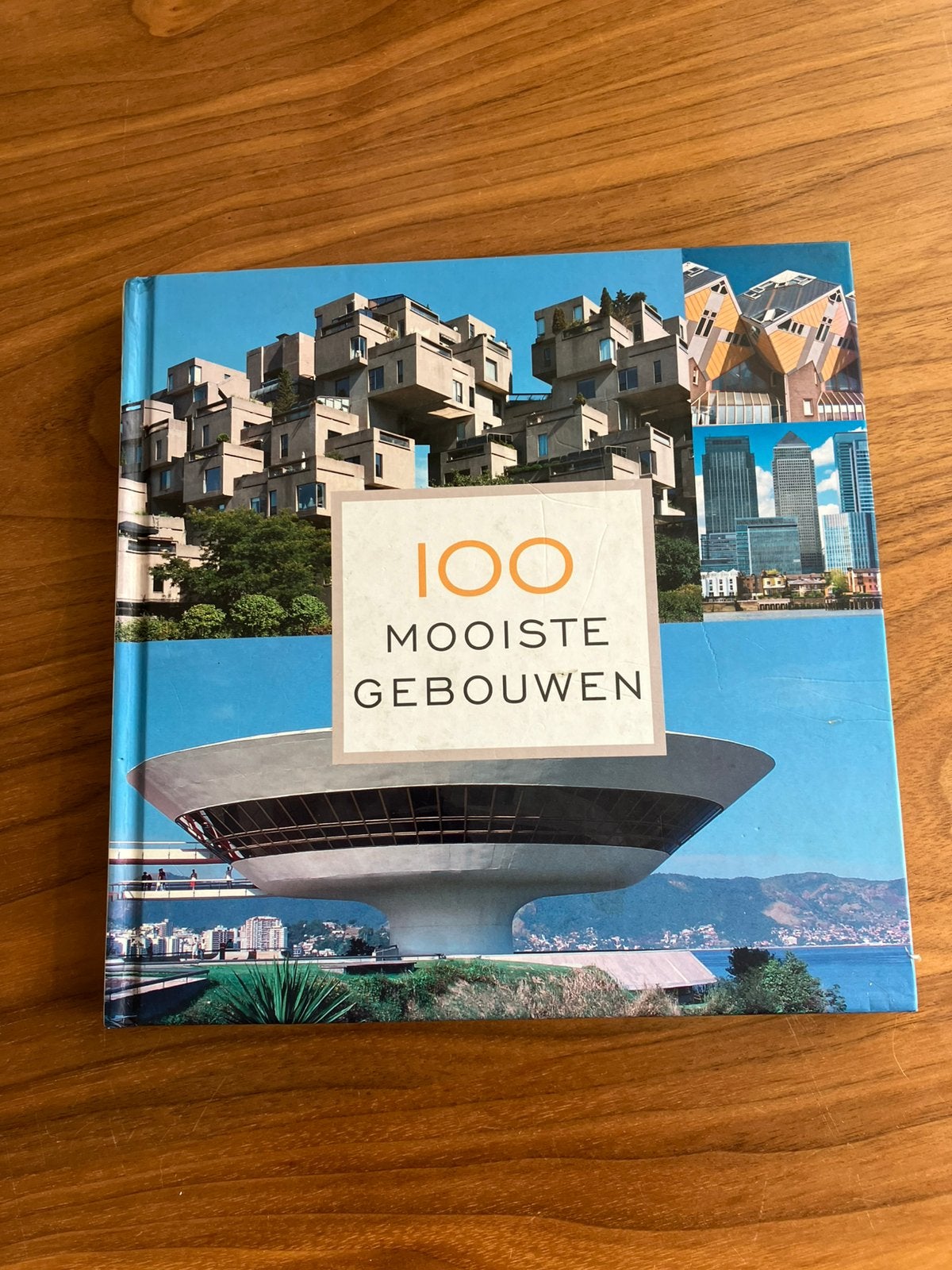 100 mooiste gebouwen (fotoboek), Ophalen of Verzenden, Zo goed als nieuw