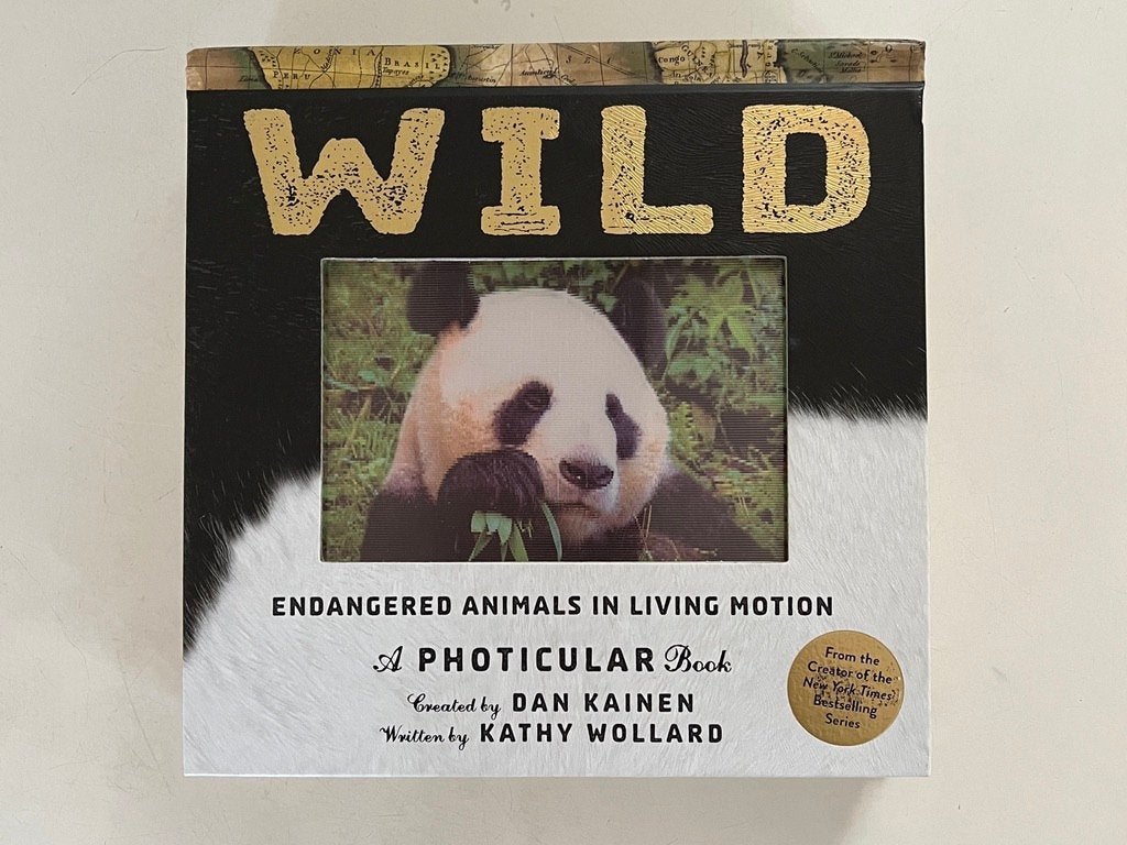 Wild, boek met bewegende dierenplaten, Boeken, Ophalen of Verzenden, Natuur algemeen