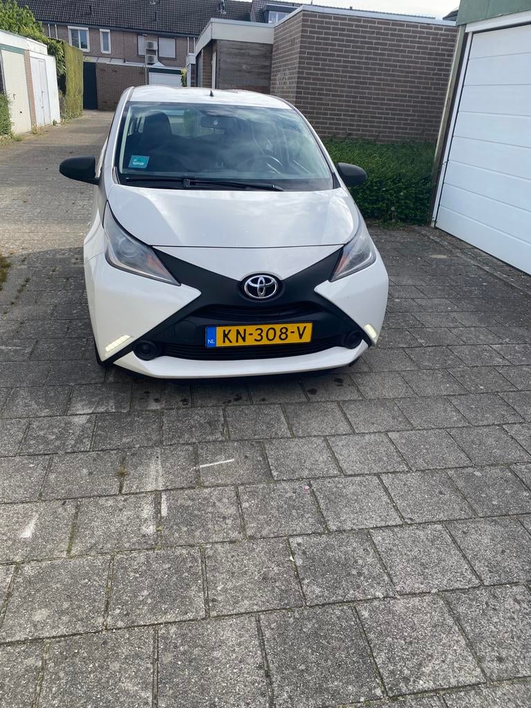 Toyota Aygo 1.0 12V Vvt-i Ddrs 2016 Wit, Auto's, Toyota, Voorwielaandrijving, Stof, Euro 6, 4 stoelen